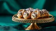 © fivan - Cannoli displayed on golden cake stand, emerald backdrop, luxurious high-end vibe, copy space