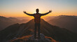 © Luiz - Man standing on mountain peak with arms outstretched at sunset scenery