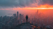 © aboutnuylove - Man standing on top of a mountain and looking at the city at sunrise