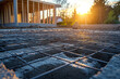 © Martinesku - Concrete base and steel reinforcement grid at housing site.