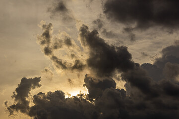 Wall Mural - Cloudscape, Colored Clouds at Sunset near the Ocean on a Cloudy Day