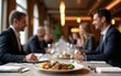 © wang - Business lunch meeting at a classy restaurant. High quality