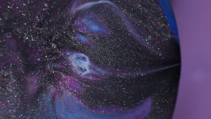 Wall Mural - Blur glitter drip. Prism fluid. Black shimmering liquid leak on sphere lens abstract background. Purple blue paint spill color mix.