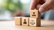 © Piya W. - Concept of equality and fairness promoting gender diversity in workplace. hand builds with wooden block symbol for human rights law and social justice support