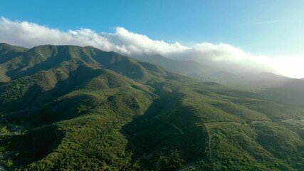 Wall Mural - Clouds Blanketing The Peak Of Palomar Mountain At The Peninsular Ranges In California. Aerial Flyover