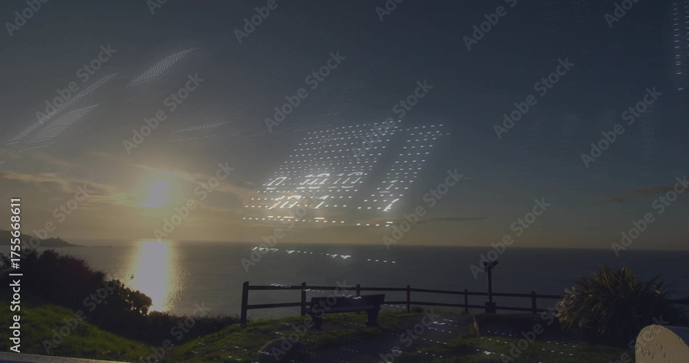 Floating digital code overlay above coastal overlook with bench, metal ...