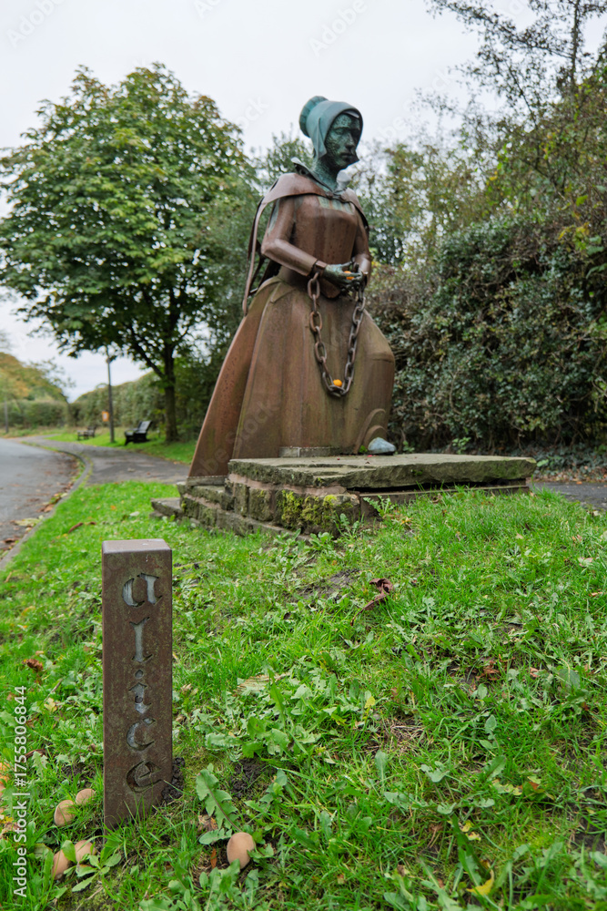 Roughlee, Lancashire, Oct 7 2025 – Weathered metal statue of Alice ...