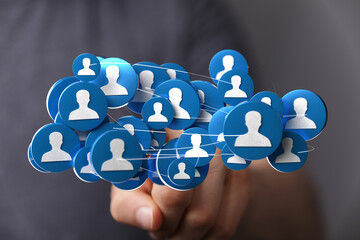 Wall Mural - Close up of hand touching social media network of people. Connection, communication, teamwork and digital illustration concepts.