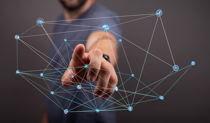 Wall Mural - Abstract image of a hand interacting with a digital network, representing connection, technology, and innovation.