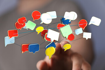 Wall Mural - Abstract image of speech bubbles linked together, symbolizing communication, connection, and digital information exchange.
