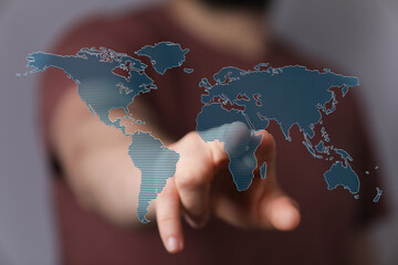 Wall Mural - Hand pointing at world map, digital technology, global network, connection, business, internet, communication, worldwide, futuristic