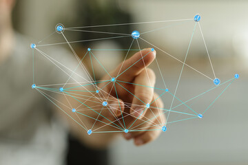 Wall Mural - A human hand interacts with a network diagram, representing technology, connection, communication, and digital transformation. Perfect for illus