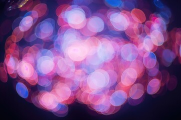 Wall Mural - Colorful blurred bokeh lights creating a festive and abstract party atmosphere