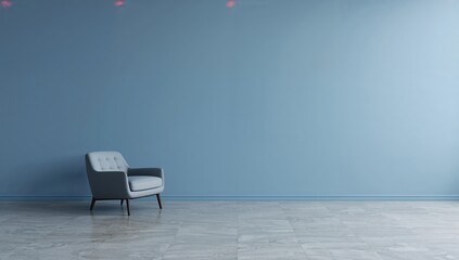 Wall Mural - A gray armchair positioned against a plain blue wall in the lounge area
