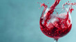 © aboutnuylove - red wine splashing out of a glass, on a blue background