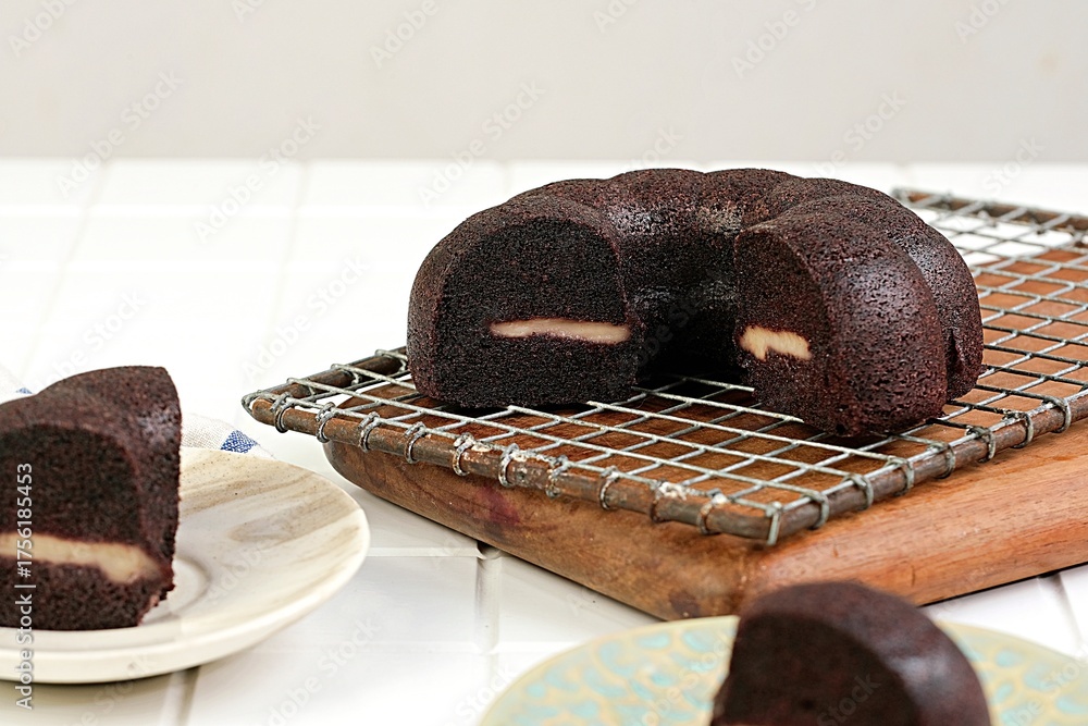 Black Glutinous Rice Cheese Brownies placed on cooling rack with rustic ...