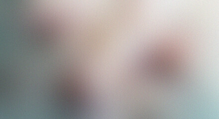 Soft focus, abstract background with warm, diffused light and subtle color variations.