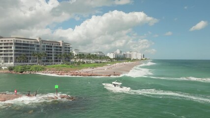 Wall Mural - Aerial Drone view of Boca Raton Inlet, Florida with city and beach