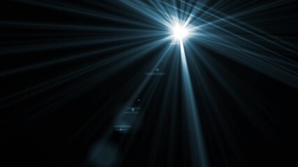 Wall Mural - Intense blue anamorphic lens flare with starburst rays moves across black background. For cinematic overlays, sci-fi intros, or dynamic transitions