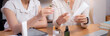 © NT_studio - Two asian businesswoman testing and researching cosmetic product or cream in bottle in office, two business woman creative with planning project design package of skincare, development and business.