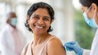 © N7 - Smiling Indian patient receiving vaccine — symbolizing safety, confidence, and preventive healthcare