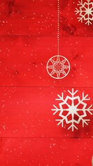 Wall Mural - Animation of snow falling against christmas decoration on red boards