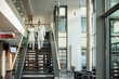 © Westend61 - Doctor and nurse in conversation walking down hospital stairs