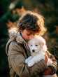 © Verlena - Young boy cuddling puppy outdoors. Perfect for pet care, childhood, emotional storytelling, and social media use.