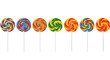 © Raul - Seven colorful lollipops stand side by side, each with a unique swirl pattern and a stick.