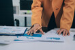 © ARMMY PICCA - Accounting company provide finance and taxation planning for profitable cash flow, Auditor and accountant team working in office, analyze financial data and accounting record with calculator.Insight