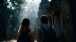 © Thares2020 - Two backpackers explore ancient jungle temple ruins bathed in ethereal sunbeams