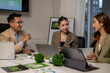 © Wasana - Business team discussing esg strategy in a corporate meeting