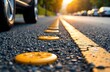 © starush - Yellow speed bumps on asphalt road with parked cars and sunset in background