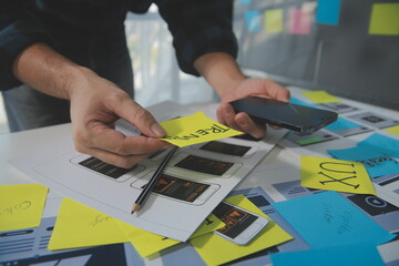 ux Graphic designer creative sketch planning application process development prototype wireframe for web mobile phone . User experience concept.