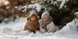 © Andrii Zastrozhnov - Caucasian young children enjoying winter snow play in cozy warm clothing