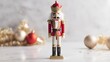 © Line - Traditional nutcracker figure with gold holiday decor