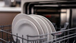 © photo for everything - Clean plates neatly stacked in the dishwasher, ready for the next cycle. A testament to modern convenience, ensuring sparkling dishes after every meal. Tidiness!