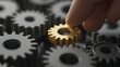© photo for everything - Precision in motion: A golden gear is carefully placed among silver ones, symbolizing strategic alignment and the value of each component for system's peak efficiency.