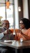 © MikeLegend - Couple enjoying drinks together in a cozy cafe setting