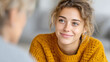 © Sergey - Teen and therapist engaged in conversation in sunlit room for emotional wellness and support