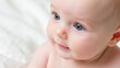 © K silver - Happy baby smiling indoor portrait photography soft lighting close-up joyful expression