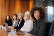 © World of AI - Professional businesswomen collaborating around conference table in modern corporate boardroom