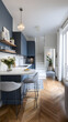 © Antoine - Cuisine moderne avec des meubles contemporains et un escalier à proximité dans un espace lumineux