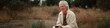 © Andrii Zastrozhnov - Elderly caucasian male in nature holding smartphone