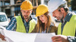© Anastasiia Trembach - Three construction professionals in hard hats and high visibility vests examine detailed blueprints at an active building site, coordinating plans, safety measures, and project timelines together.