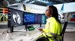 © Andrey Popov - Female Aerospace Engineer Designs Aircraft Maintenance Software