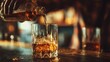 © ปฏิภาน ผดุงรัตน์ - Whiskey being poured into a glass, showcasing a rich golden hue and a luxurious feel. The lighting enhances the amber color of the drink and the texture of the glass