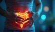 © Viktor - Young woman shows bright red glowing intestines. Female presses hands to belly. Healthcare issue with digestion system and bowel. Concept for intestinal problems illness and gut health.