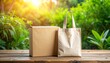 © andre - Eco-Friendly Packaging Sustainable Shopping Bag and Cardboard Box on Wooden Table in Nature
