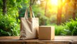 © andre - Eco-friendly reusable shopping bag and delivery box in a sunny natural environment
